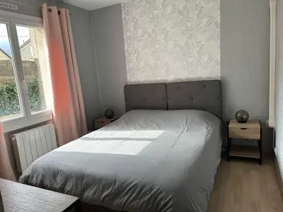 Un ou plusieurs lits dans un hébergement de l'établissement La maison du chêne