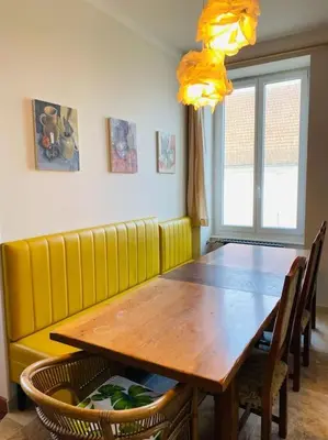 Coin salon dans l'établissement Gîte de la maison jaune - Comblanchien