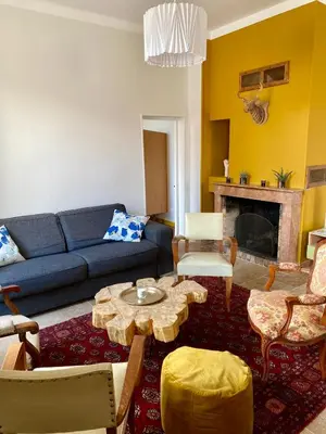 Coin salon dans l'établissement Gîte de la maison jaune - Comblanchien