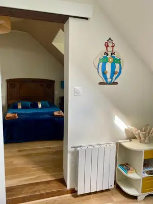 Un ou plusieurs lits dans un hébergement de l'établissement Gîte de la maison jaune - Comblanchien