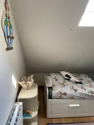 Un ou plusieurs lits dans un hébergement de l'établissement Gîte de la maison jaune - Comblanchien