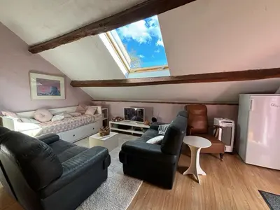 Coin salon dans l'établissement La Maison du bonheur - Gîte RULINA - Corancy