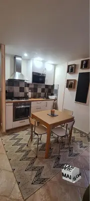 Cuisine ou kitchenette dans l'établissement La Petite Maison de l'Oze