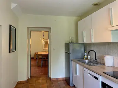 Cuisine ou kitchenette dans l'établissement Maison de la Ferme