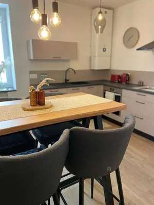 Cuisine ou kitchenette dans l'établissement La maison douce