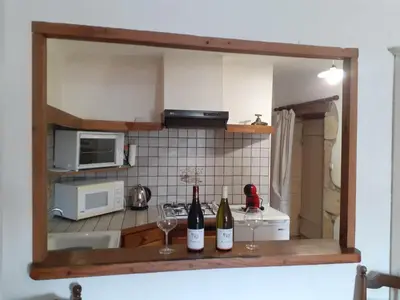 Cuisine ou kitchenette dans l'établissement Le Vendangeur