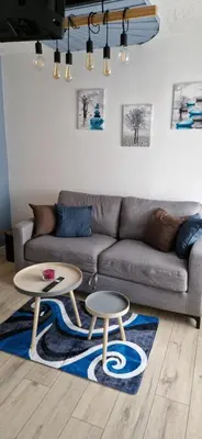 Coin salon dans l'établissement Némo Petit studio cosy.