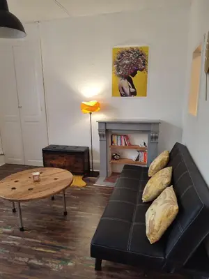 Coin salon dans l'établissement T1 lumineux et climatisé