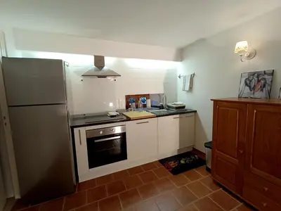 Cuisine ou kitchenette dans l'établissement La Baudinière, Gîte 