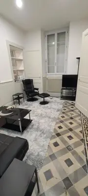 Coin salon dans l'établissement Lons-le Saunier Appartement Site remarquable