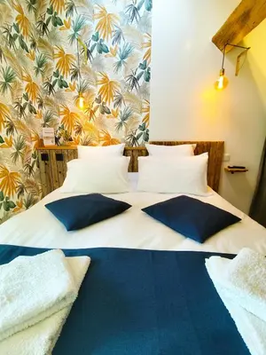 Un ou plusieurs lits dans un hébergement de l'établissement Villa Modéliacus