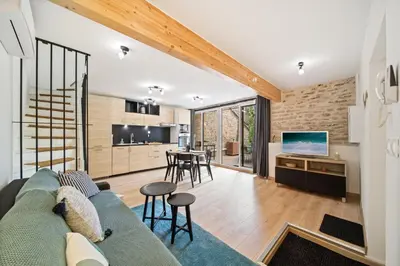 Cuisine ou kitchenette dans l'établissement LE DUPLEX