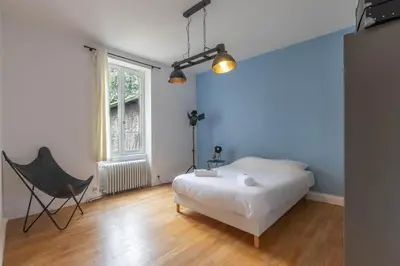 Un ou plusieurs lits dans un hébergement de l'établissement Cabana & Maison des Vignes