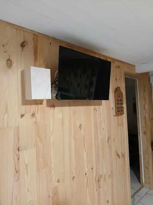 Télévision ou salle de divertissement dans l'établissement Les quatres saisons de isa