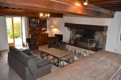 Coin salon dans l'établissement Le Hameau du Château Bourgogne Morvan