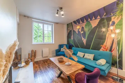 Coin salon dans l'établissement Le Jungle - Appt pour 6 avec parking privé