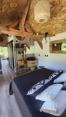 Un ou plusieurs lits dans un hébergement de l'établissement Lodge du Château de Feschaux