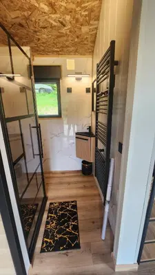 Cuisine ou kitchenette dans l'établissement Lodge du Château de Feschaux