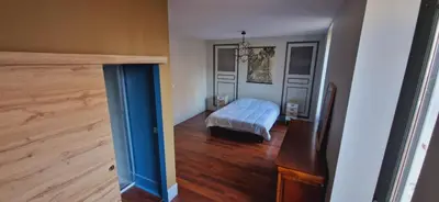 Un ou plusieurs lits dans un hébergement de l'établissement Le duplex