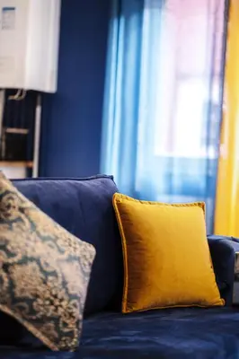 Coin salon dans l'établissement Appart hôtel le 8 La Suite - parking gratuit -