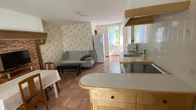 Cuisine ou kitchenette dans l'établissement La Belle Marguerite, appartement privé dans maison
