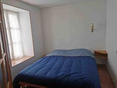 Un ou plusieurs lits dans un hébergement de l'établissement La Belle Marguerite, appartement privé dans maison
