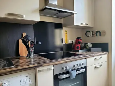 Cuisine ou kitchenette dans l'établissement Dynastie 21 - Appartement 4 personnes Dijon Centre