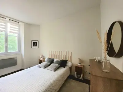 Un ou plusieurs lits dans un hébergement de l'établissement Dynastie 21 - Appartement 4 personnes Dijon Centre