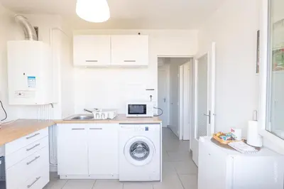 Cuisine ou kitchenette dans l'établissement Le Twins - Appartement de charme à Digoin
