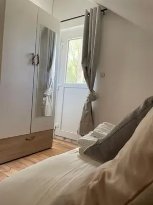 Un ou plusieurs lits dans un hébergement de l'établissement Chalet 6-8 personnes avec jeux et jaccuzi - Nahleo Chalet