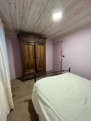 Un ou plusieurs lits dans un hébergement de l'établissement Maison de campagne