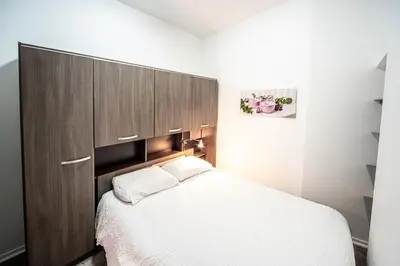 Un ou plusieurs lits dans un hébergement de l'établissement Appartement cosy Hyper centre