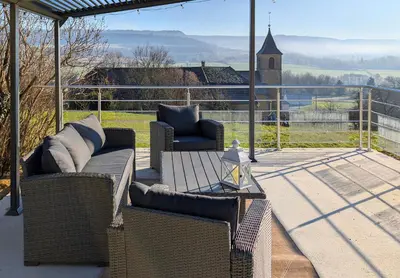 Coin salon dans l'établissement Cabana & Domaine Raison