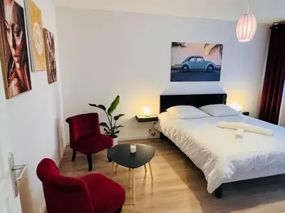 Un ou plusieurs lits dans un hébergement de l'établissement Appartement Chalon