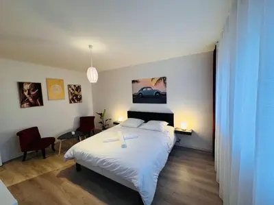 Un ou plusieurs lits dans un hébergement de l'établissement Appartement Chalon