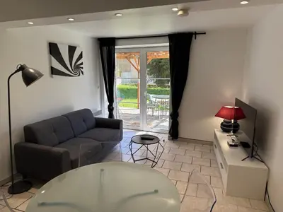 Coin salon dans l'établissement Gite du sapin - Lac de Vouglans