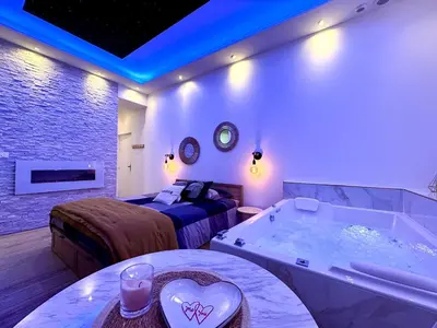 Un ou plusieurs lits dans un hébergement de l'établissement Harmonie Spa
