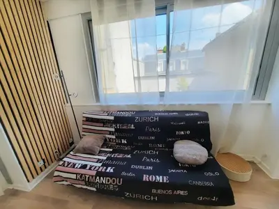 Coin salon dans l'établissement Courtépée - Apt 4 Prs avec balcon en centre ville
