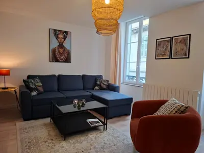 Coin salon dans l'établissement Joli appartement au coeur de Mâcon