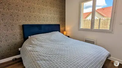 Un ou plusieurs lits dans un hébergement de l'établissement Gîte du Pin
