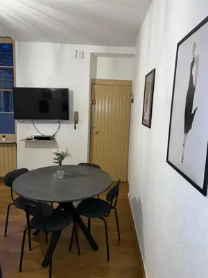 Télévision ou salle de divertissement dans l'établissement Appartement Dijon le Zola