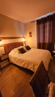 Un ou plusieurs lits dans un hébergement de l'établissement Auberge de la Marine