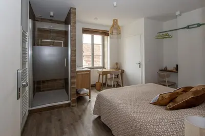 Un ou plusieurs lits dans un hébergement de l'établissement Auberge du Molveau