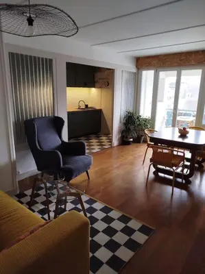 Coin salon dans l'établissement Appartement plein centre avec terrasse