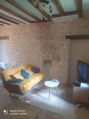 Coin salon dans l'établissement Charmant Appartement 2 pièces avec extérieur