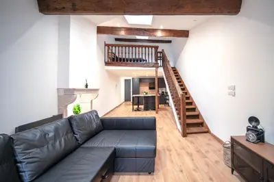 Coin salon dans l'établissement MyAppart71 - POP - Appartement en Coeur de Ville