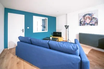 Coin salon dans l'établissement MyAppart71 - POP - Appartement en Coeur de Ville