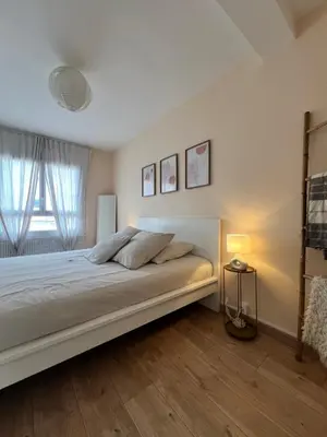 Un ou plusieurs lits dans un hébergement de l'établissement Le Bellevue - Gare & Les Jardins Darcy - T3 - Parking Free