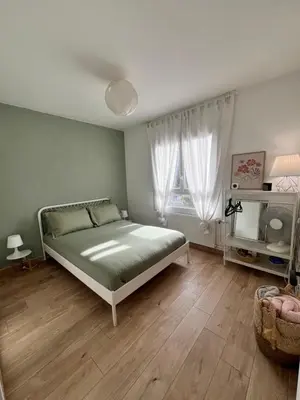 Un ou plusieurs lits dans un hébergement de l'établissement Le Bellevue - Gare & Les Jardins Darcy - T3 - Parking Free
