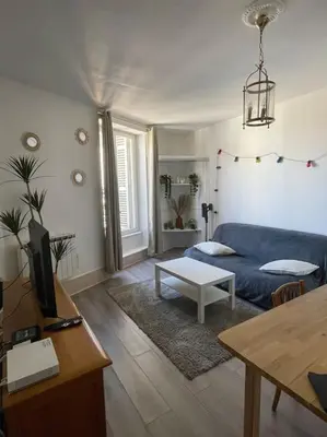 Coin salon dans l'établissement Appartement - Dijon centre